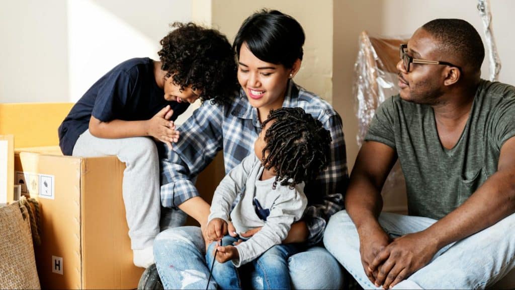 A man and woman with their children