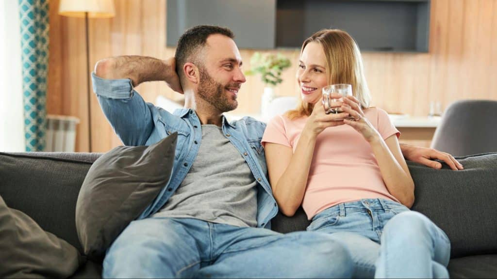A man and woman at the living room
