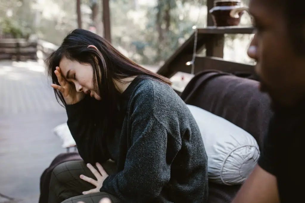 A Couple Talking to each other in sorrow