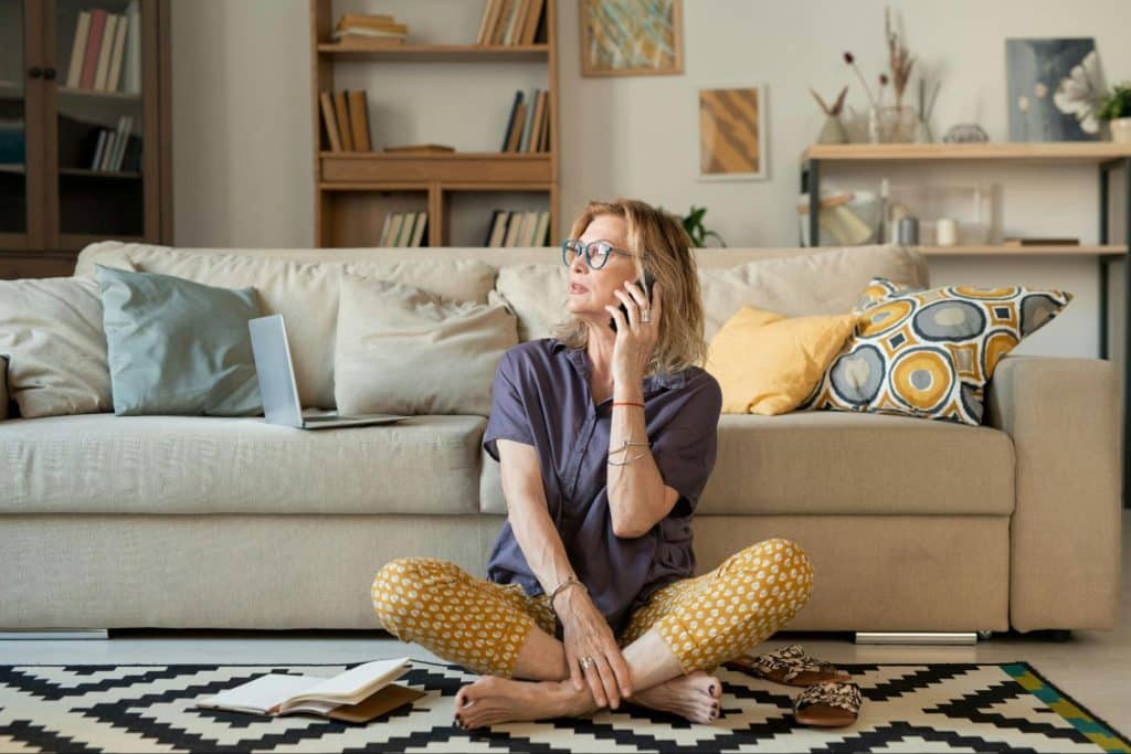 A woman relaxing on the floor