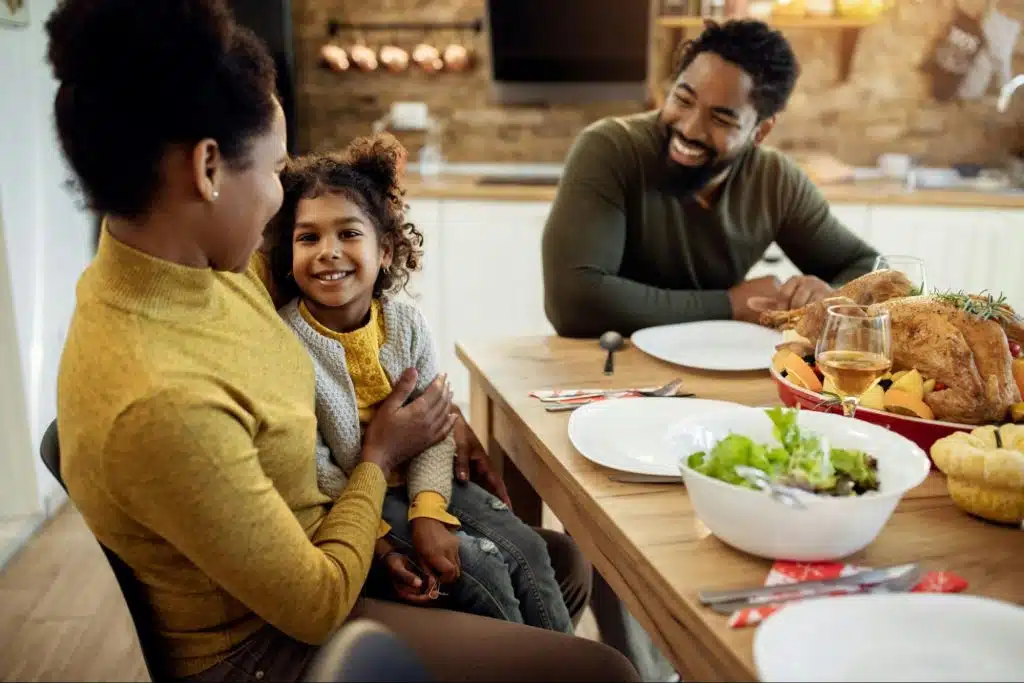 A man and woman with their kid