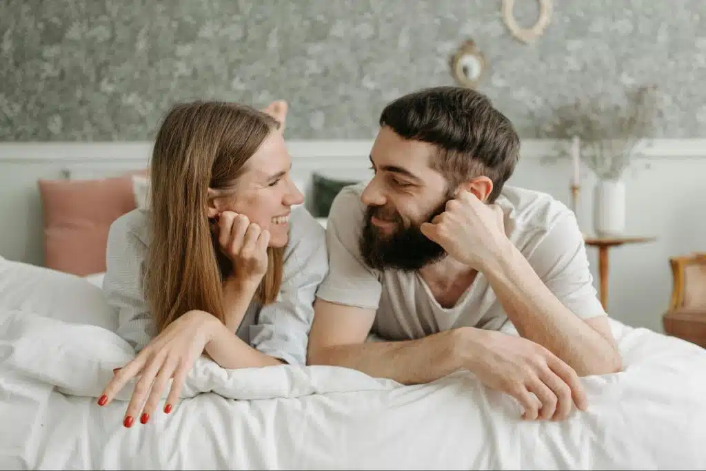 A man and woman looking at each other
