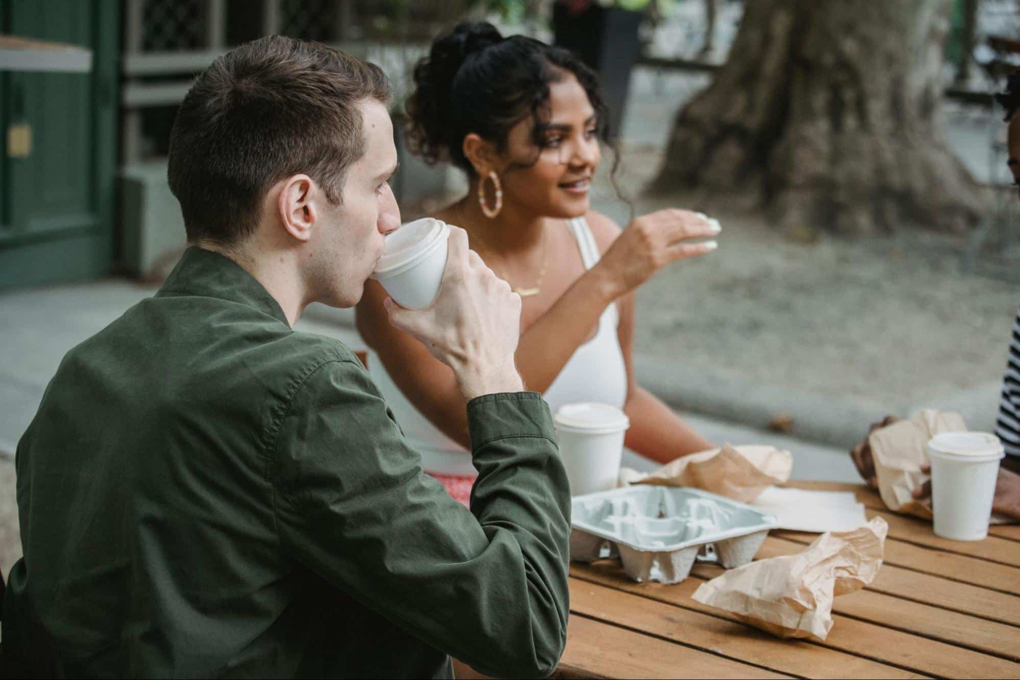 A man and woman talking 