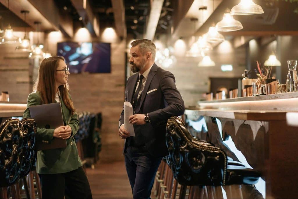 A man and woman talking