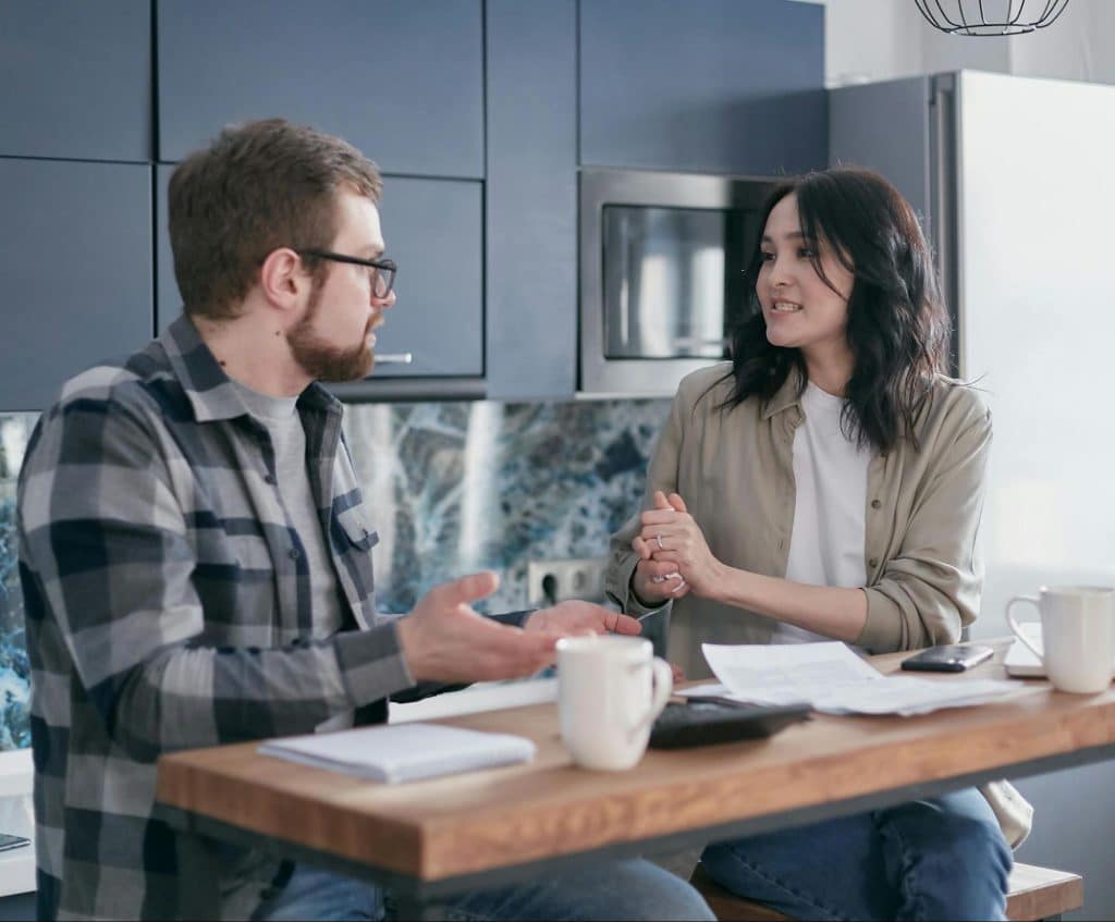 A man and woman talking