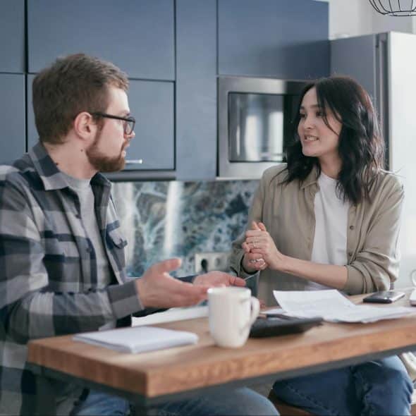 A man and woman talking