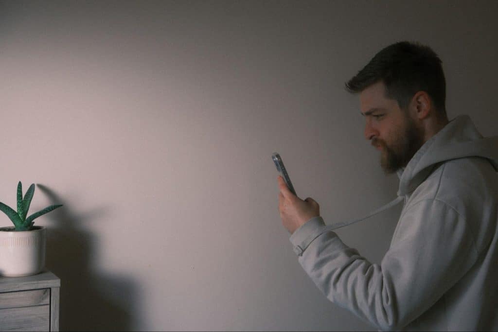 A man looking at his phone