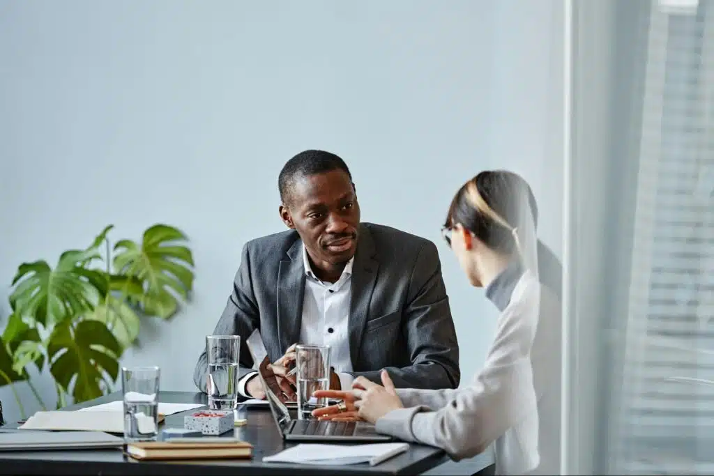 A man talking to woman