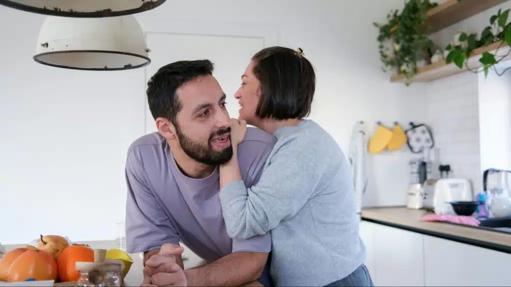 Woman hugging a man
