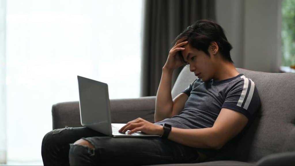 A man looking sad and tired