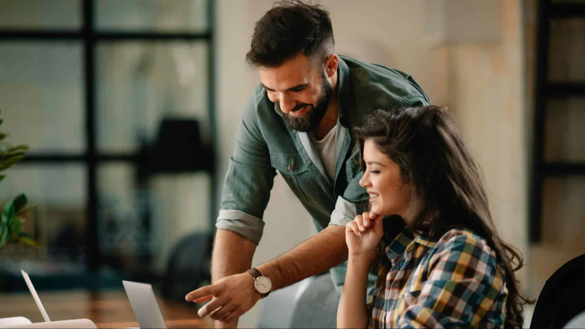 A man helping a woman