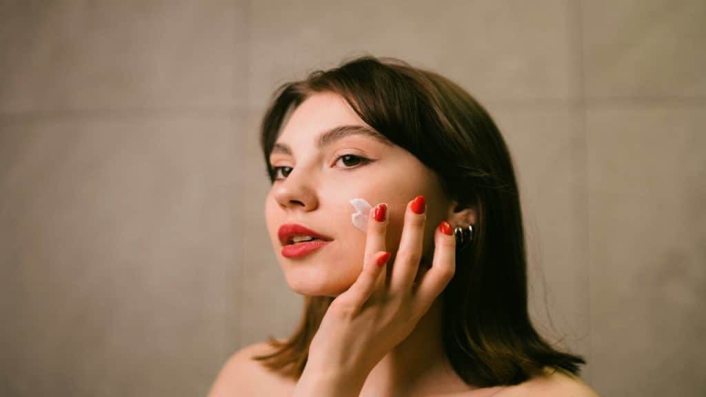 A woman doing her skincare