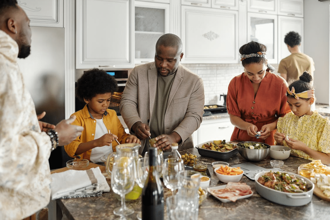A family preparing food in the kitchen