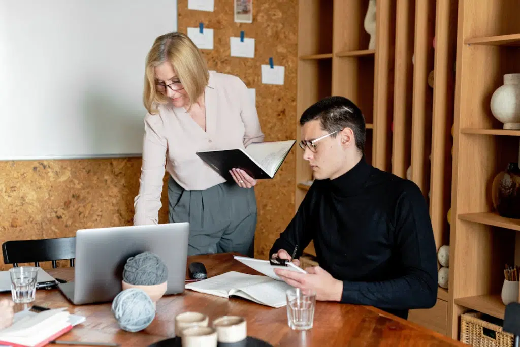 A man and a woman in an office
