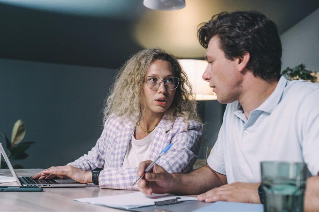 A man and woman talking