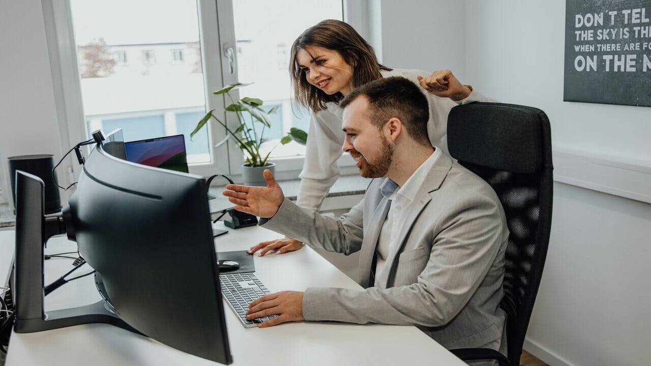 Colleagues looking at something on the computer