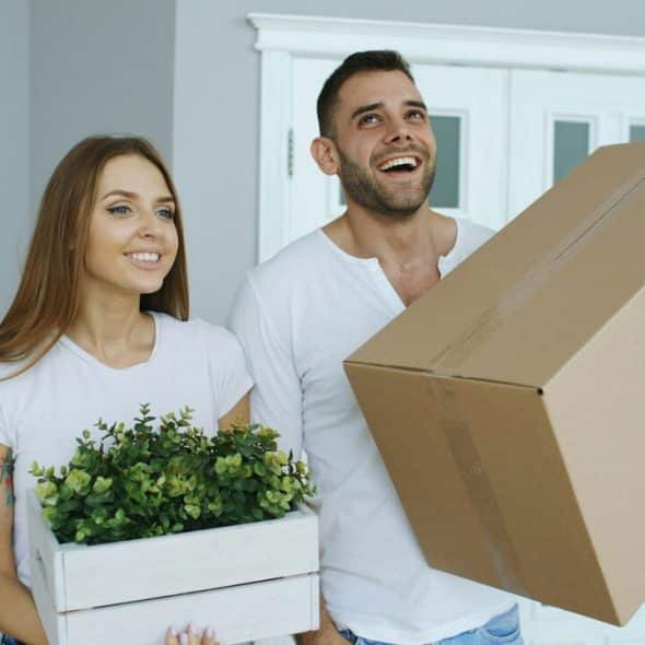 A couple moving into a new home
