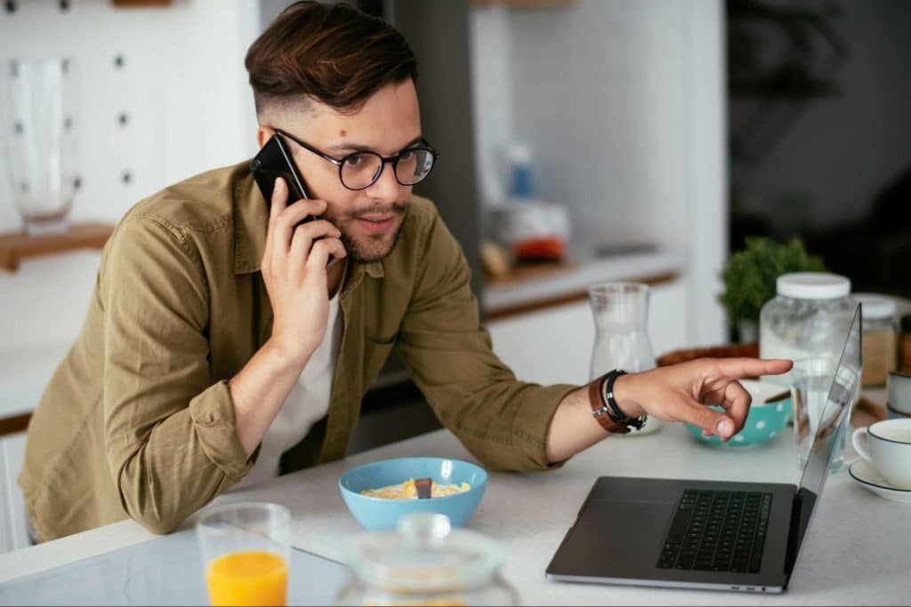 A man talking with someone over the phone