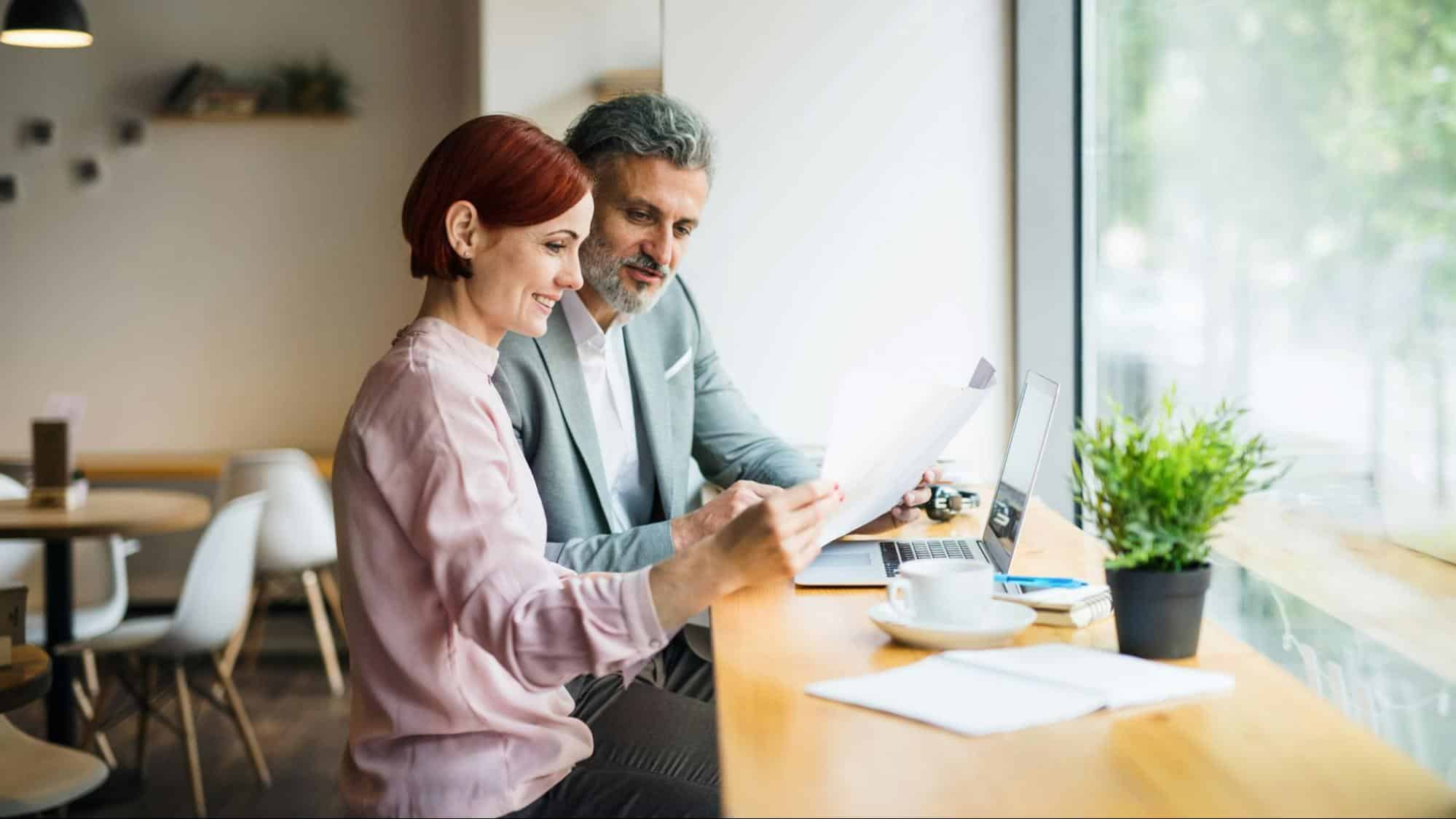 A woman explaining to a man