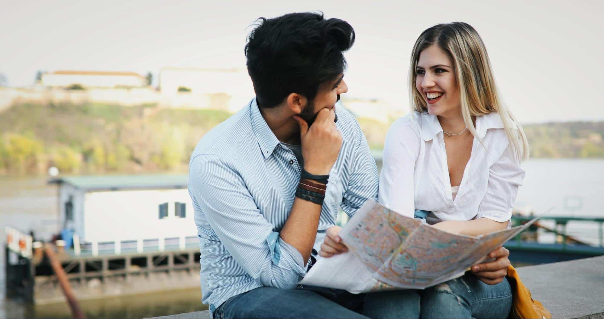 A man and woman smiling at each other
