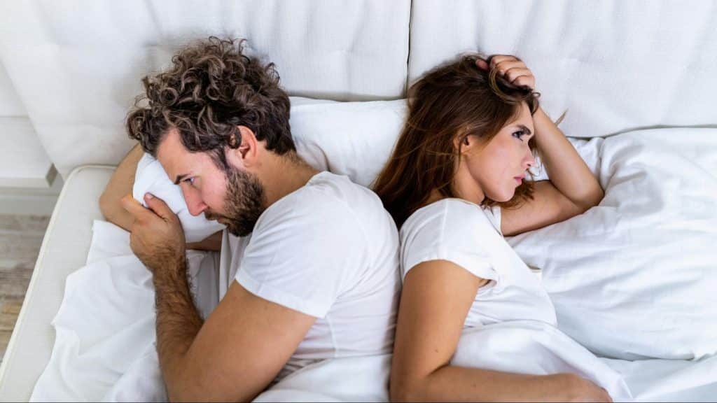 A man and woman not talking to each other