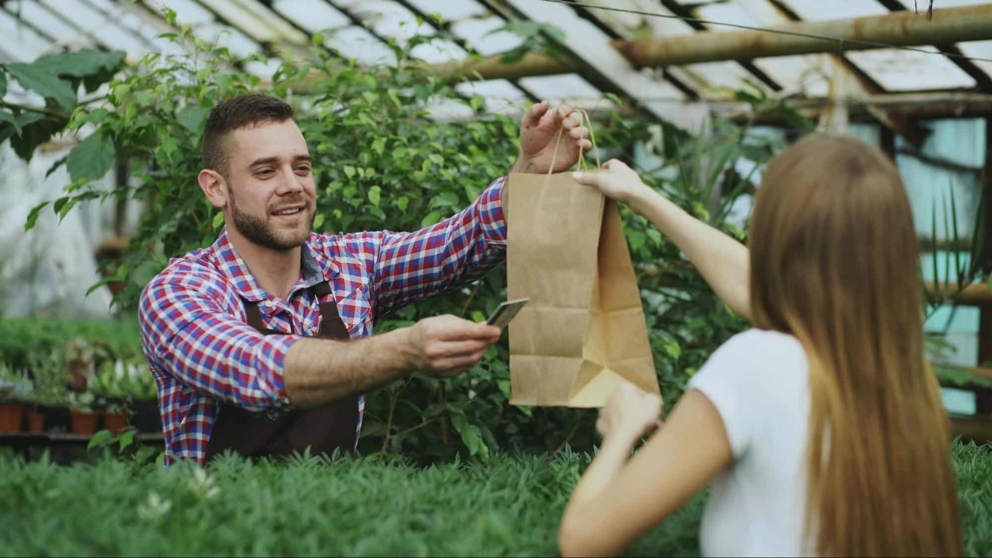 A man giving a gift to woman