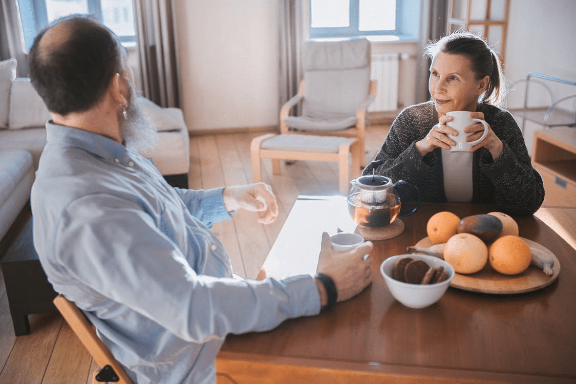 A couple having a tea together