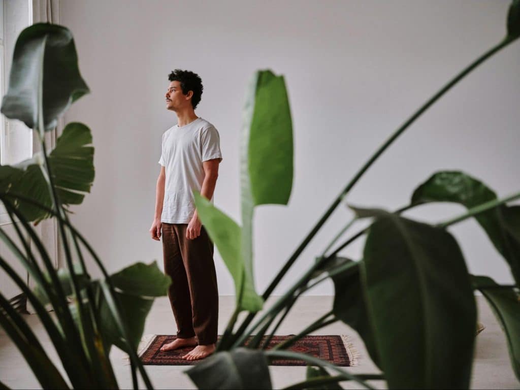 A man standing and thinking