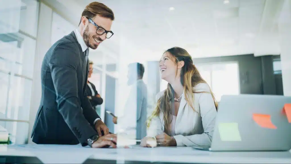 A woman looking at the attractive man
