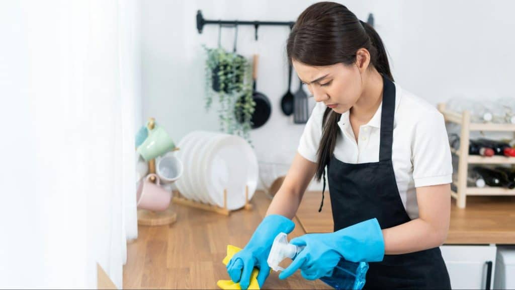 A woman doing house chores 