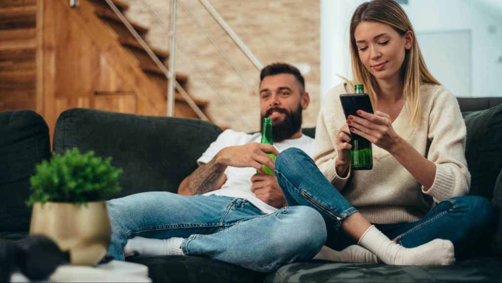 A man and woman at the couch