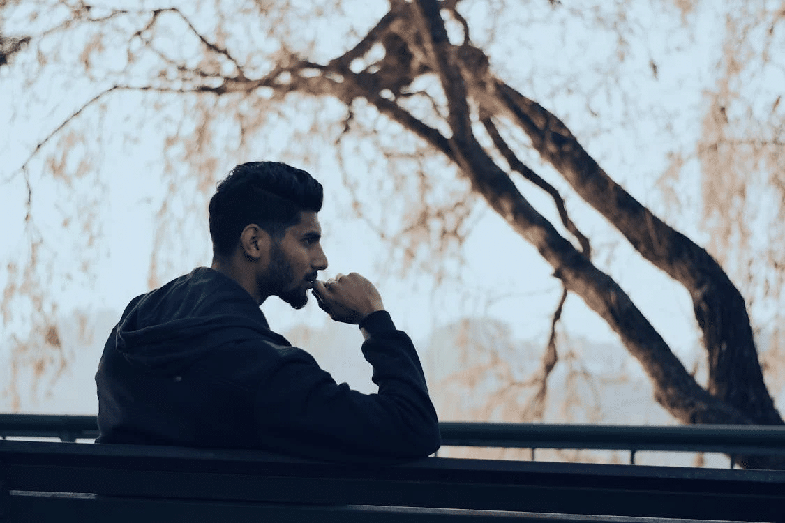 A man sitting on a bench