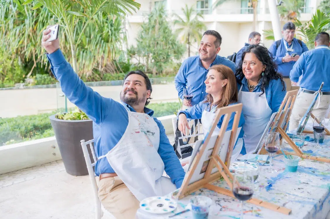 A group of people in a painting class