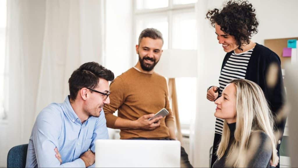 A man with his colleagues