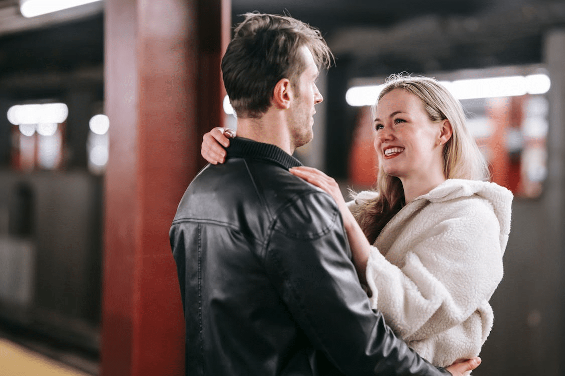 A couple at a train station
