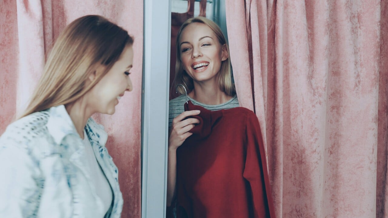 A woman trying on clothes