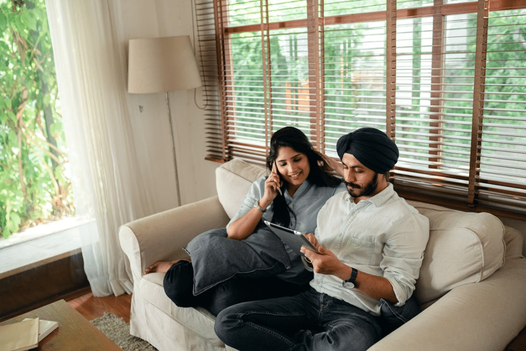 A couple sitting on the couch