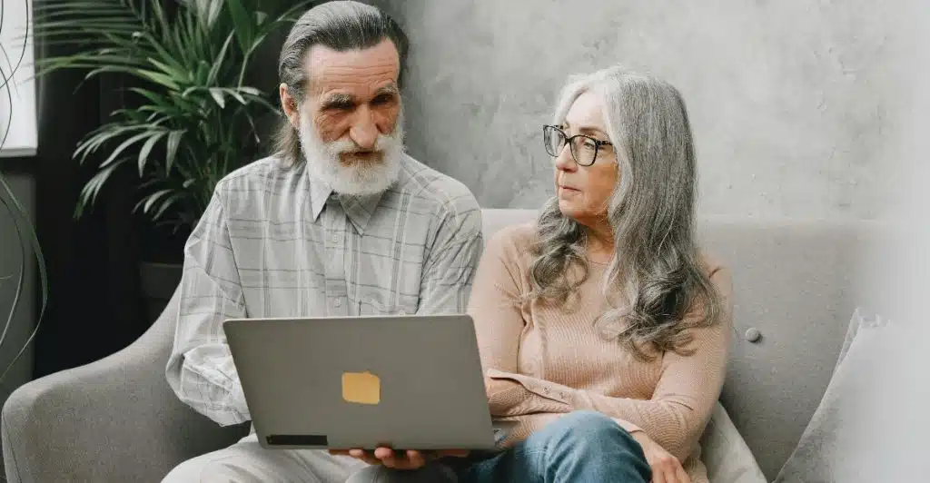 A man showing something to woman