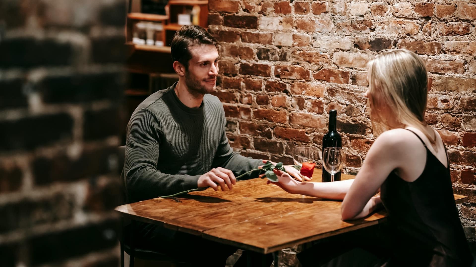 A couple talking at a restaurant