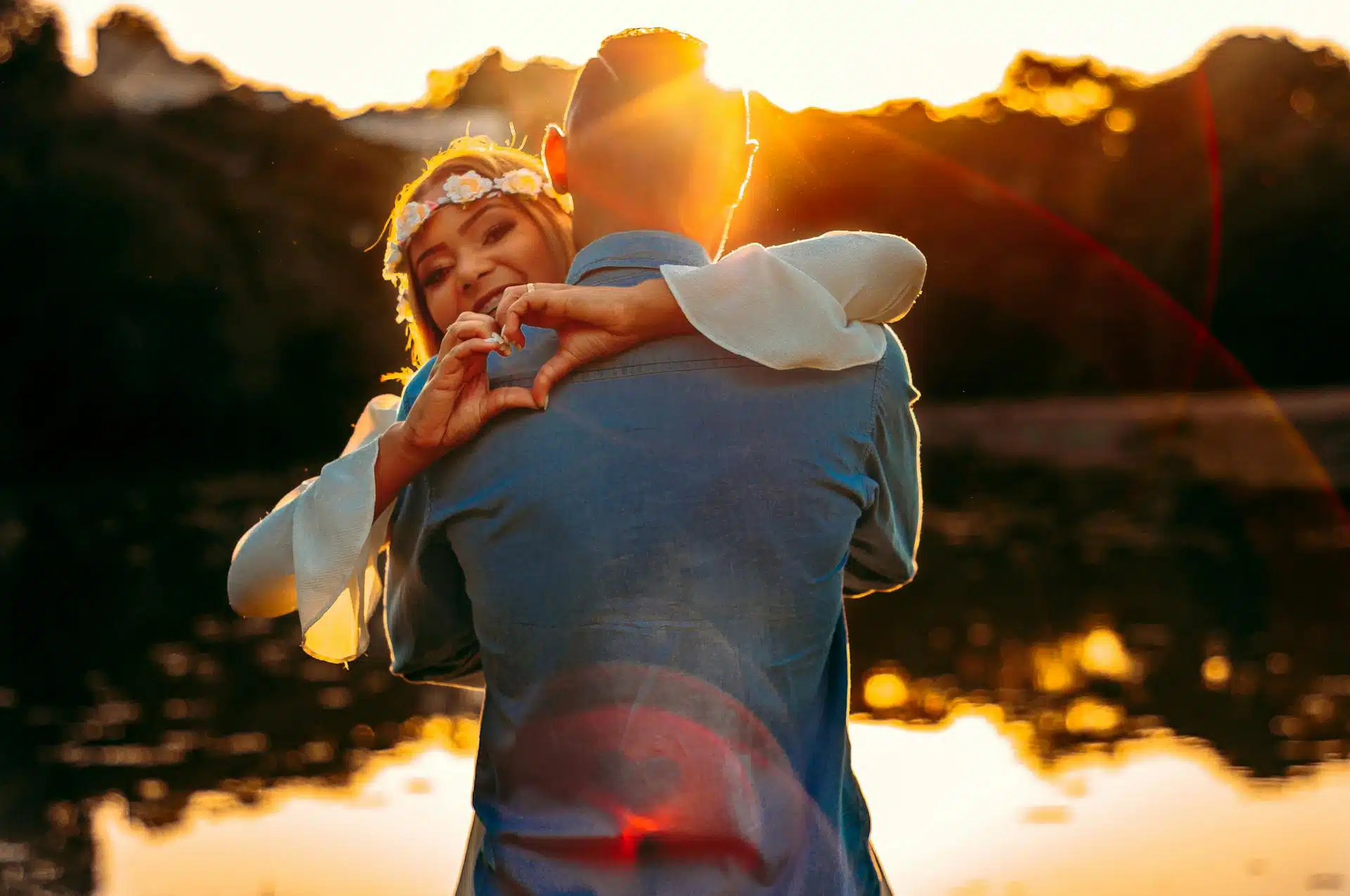 A woman hugging a man