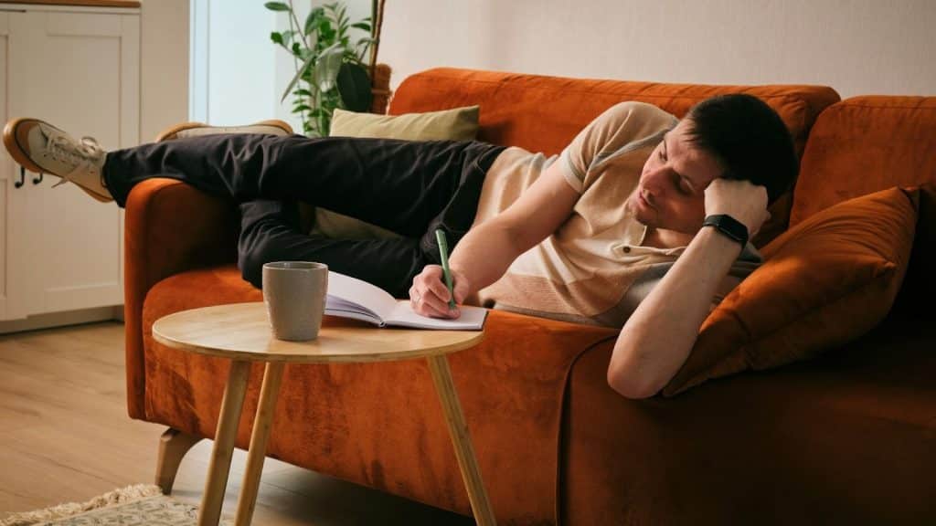 A man lying on the sofa