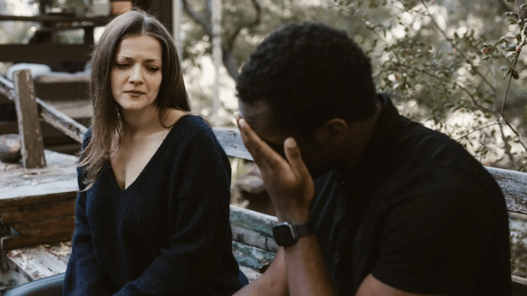 A couple crying while talking