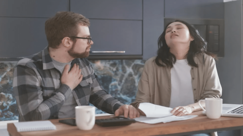 A couple talking about the bills 