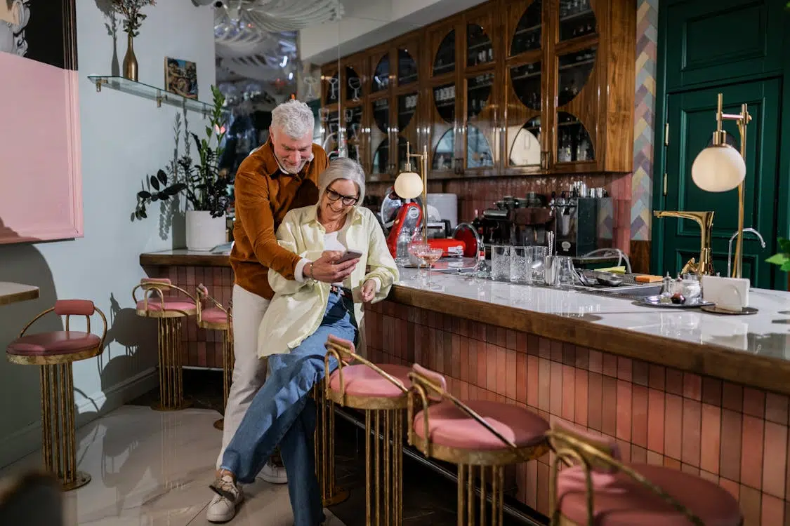 A couple looking at the phone together