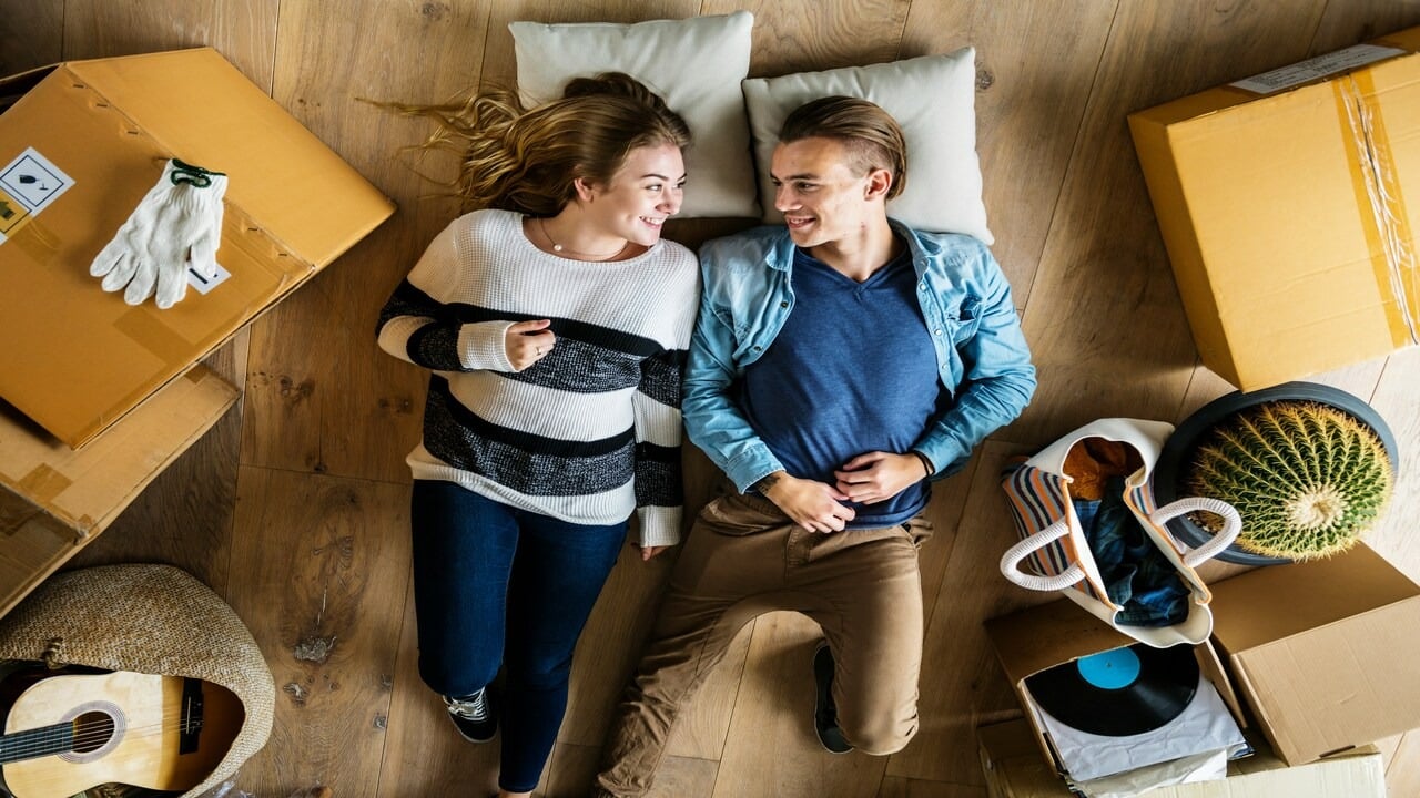 A couple laying on the floor