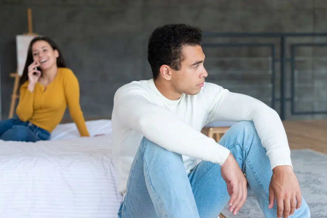 Upset man looking away