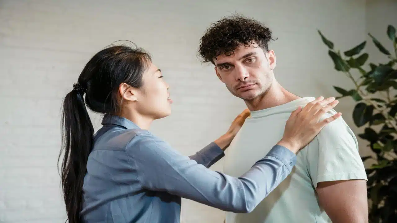 An upset woman trying to talk to her husband