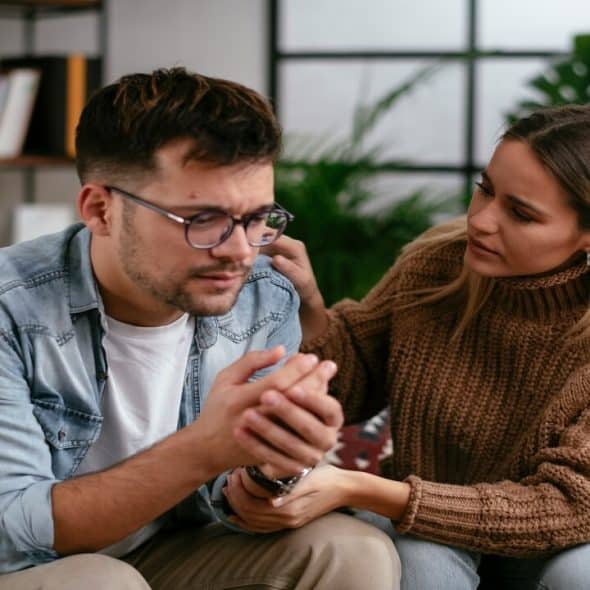 A woman supporting her depressed partner
