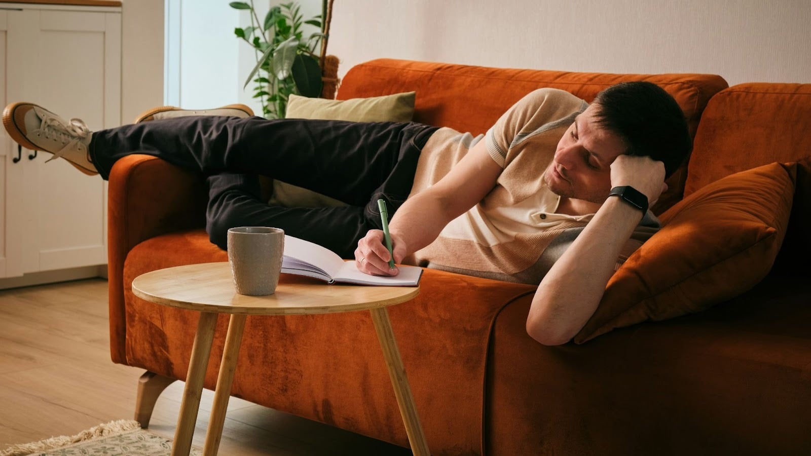 A man lying on the sofa