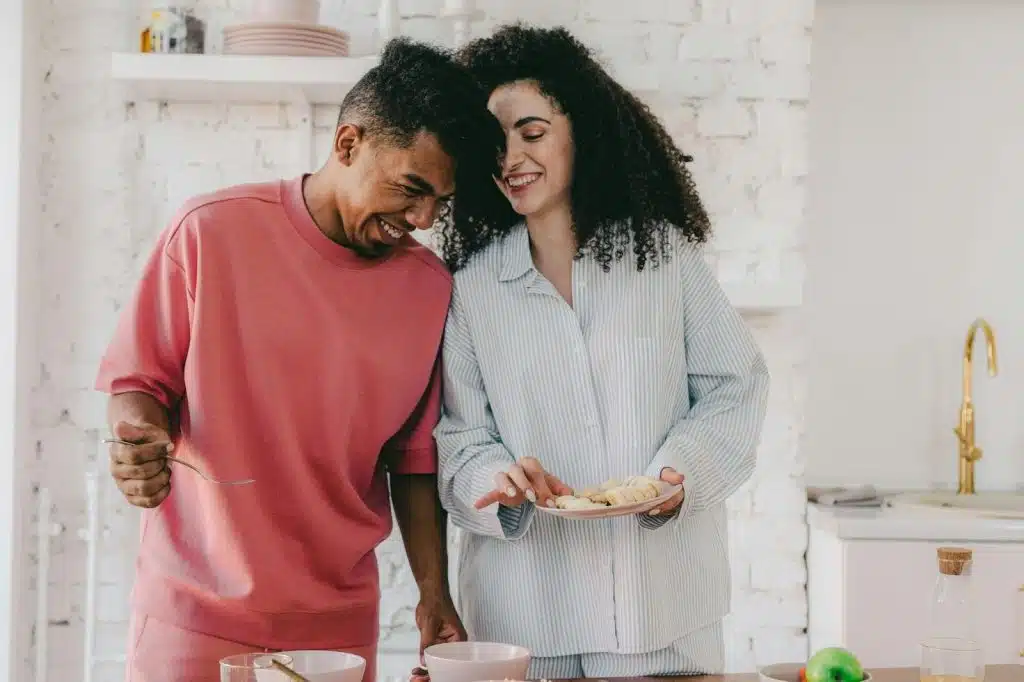 A man and a woman in the kitchen